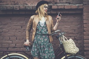 Girl on Bike with Phone