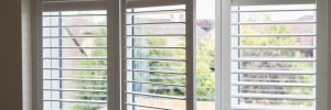 Interior shutters are a window fashion that adds a touch of architectural charm. They’re typically made from wood or faux wood and are mounted directly into the window frame, creating a clean, tailored appearance.