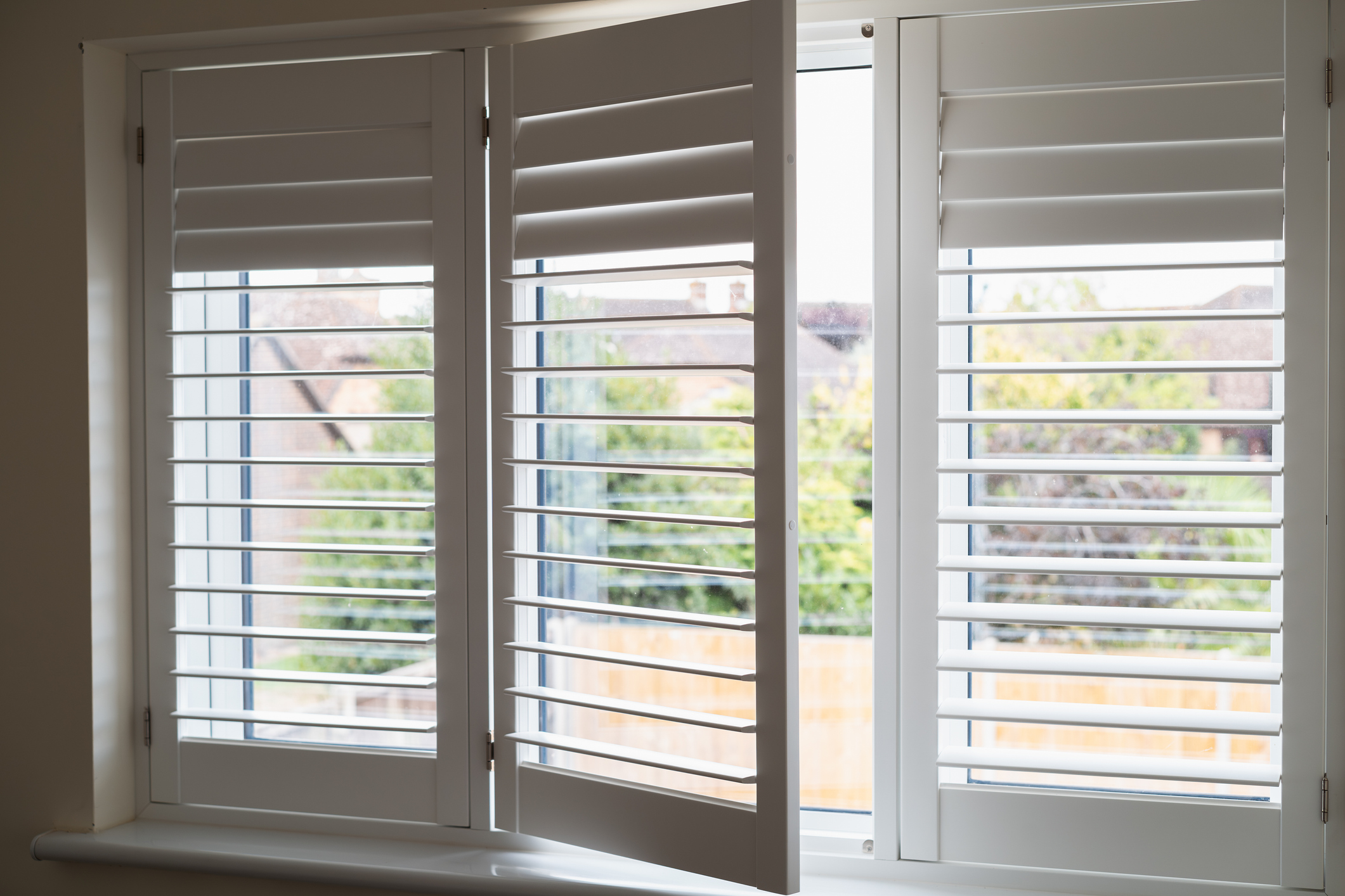 Interior shutters are a window fashion that adds a touch of architectural charm. They’re typically made from wood or faux wood and are mounted directly into the window frame, creating a clean, tailored appearance.